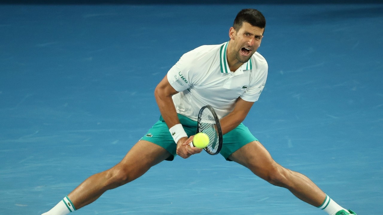 Australian Open 2021: Novak Djokovic battles through injury, gets past Milos Raonic