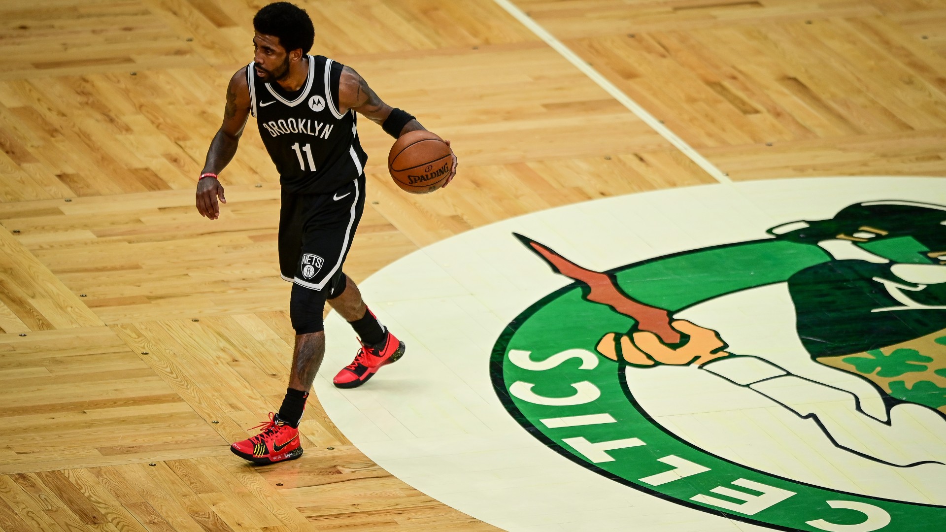 Video of Kyrie Irving stomping on Celtics logo sparks NBA Twitter debate over ‘classless act’