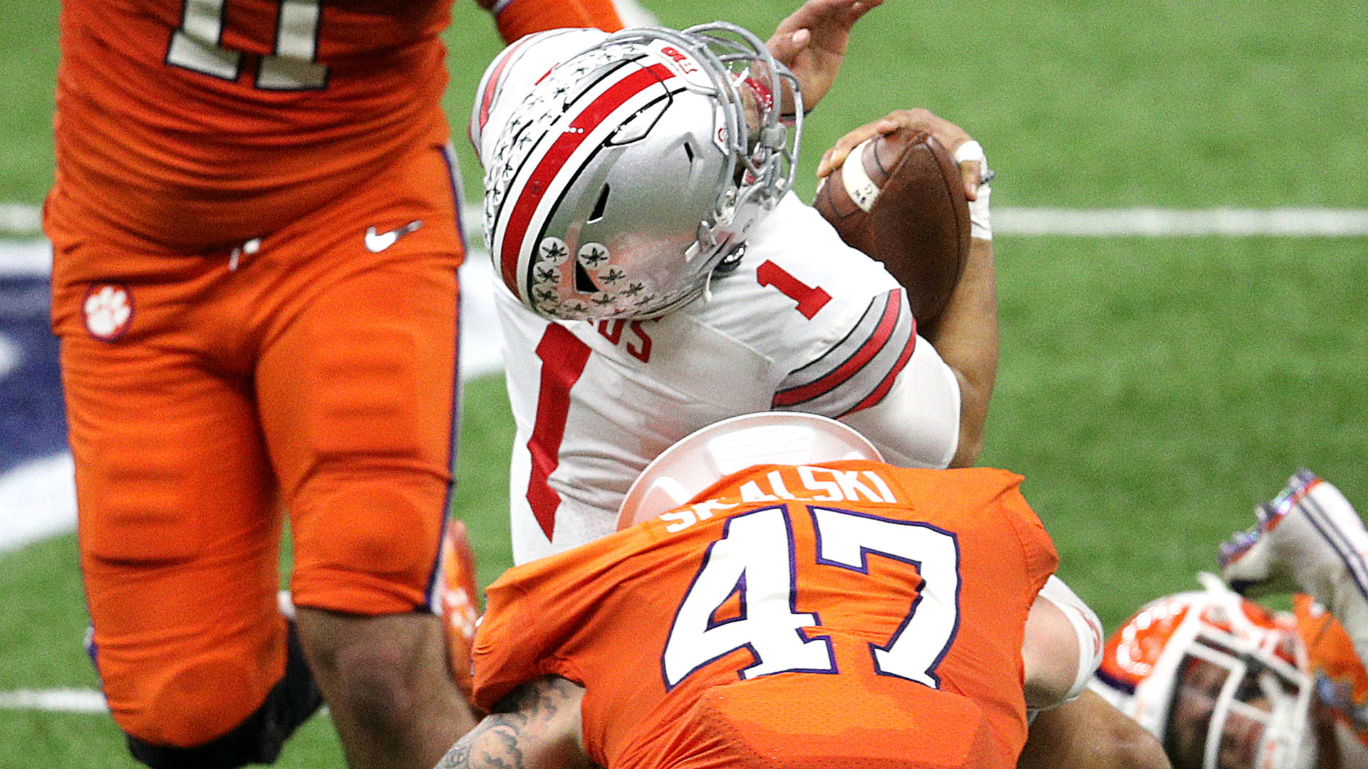 Ohio State's Justin Fields shows he has the heart -- and ribs -- of a champion