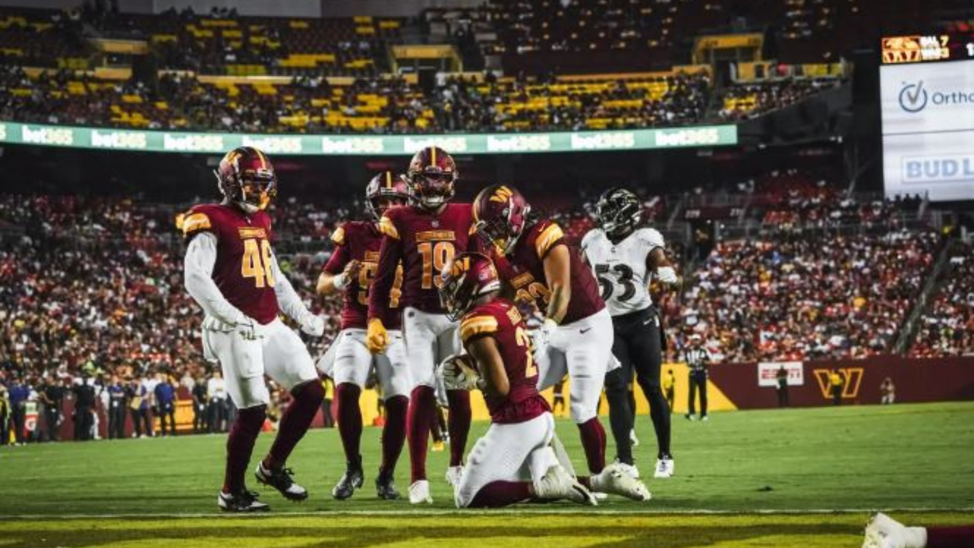 Washington Commanders Quan Martin celebrates