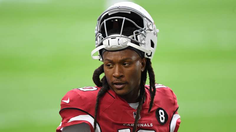 Which two NFL teams is free agent DeAndre Hopkins scheduled to