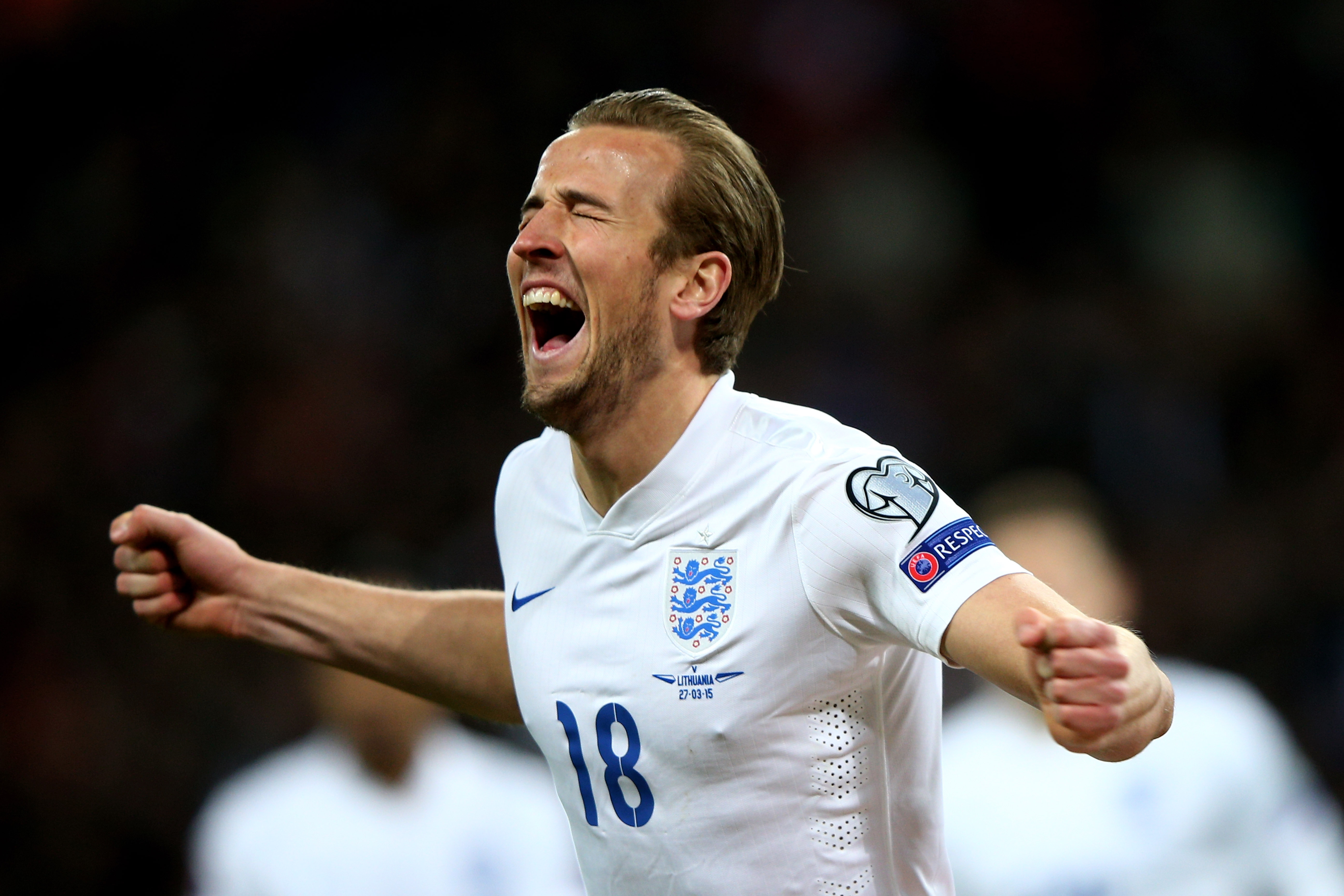 Harry Kane celebrates scoring on his England debut