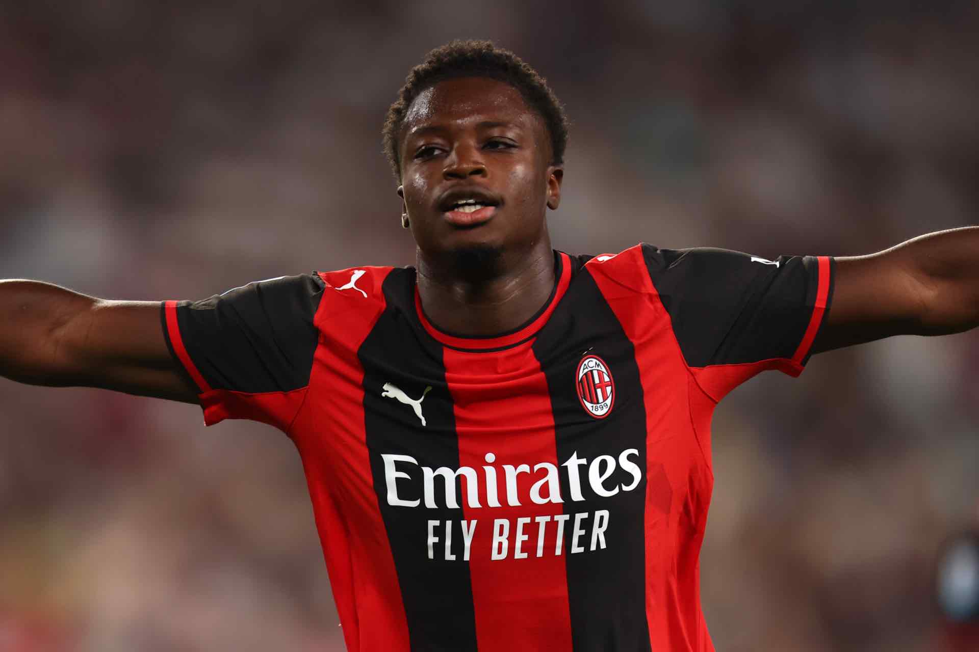 cisse-esulta-in-maglia-milan_1o926dgmzp5f21bm7xcjbugkrj.jpg