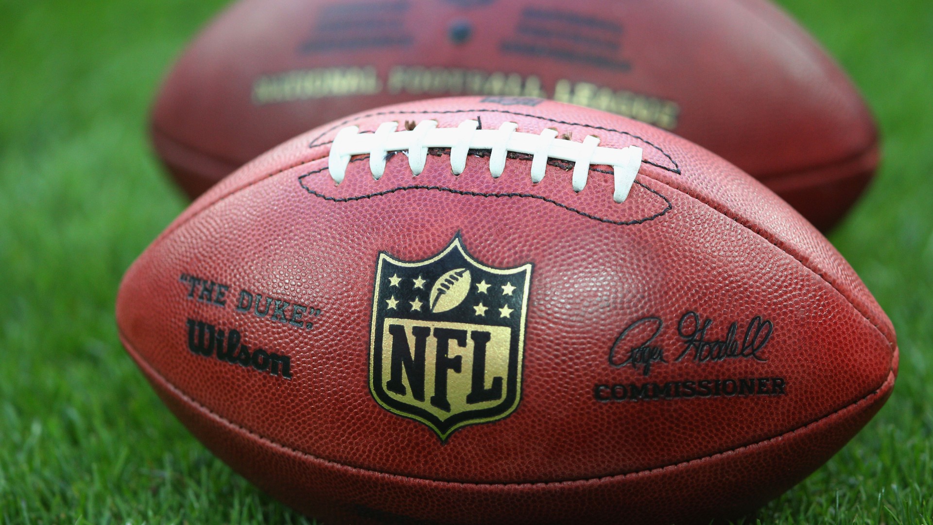 What is the ball played in the NFL made out of?