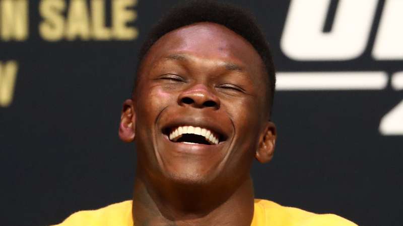 Israel Adesanya, Tyron Woodley exchange heated jabs on Twitter