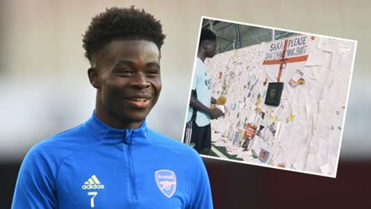 Saka presented with wall of positive messages & letters on his return to Arsenal