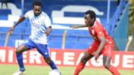 Timonah Wanyonyi (L) of Sofapaka FC contest for the ball with Brian Otieno of Bandari FC.