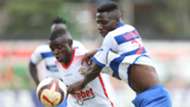 Mark Bikokwa (L) of Ulinzi Stars tackled by Lewis Wanamia of AFC Leopards.