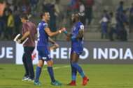 Lucian Goian of Mumbai City FC and Achille Emana Edzimbi of Mumbai City F