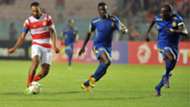 Club Africain player Saber Khalifa (L) fights for the ball with Kampala City Council FC players Ibrahim Kizza (C) Brian Umony.
