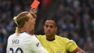 Referee Ismail Elfath; Brek Shea Vancouver Whitecaps