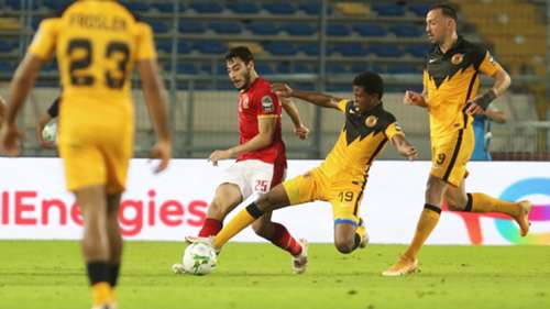 Happy Mashiane of Kaizer Chiefs fouls Akram Tawfik of Al Ahly