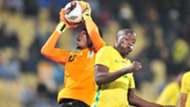 Aishi Manula of Tanzania challenged by Judas Moseamedi of South Africa.
