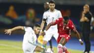 YOUCEF ATAL of Algeria and Riyad Mahrez v AYUB TIMBE of Kenya Harambee Stars.