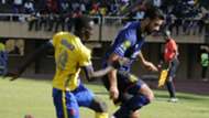 Haythem Jouini (R) of Esperance Sportive de Tunis (EST) and Bernard Muwanga (L) of Kampala Capital City Authority FC (KCCA), July 2018