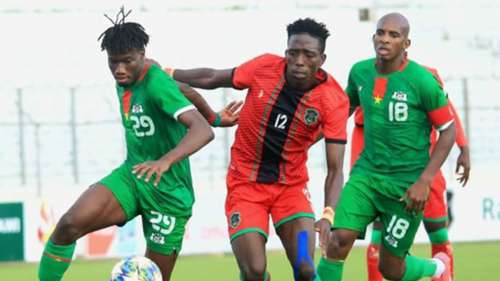 Malawi defender precious Sambani and Georgia midfielder Francisco Martinga.