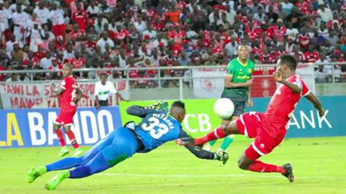 Metacha Mnata of Yanga SC and John Bocco of Simba SC.