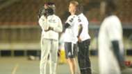 Gor Mahia coach Dylan Kerr and Zedekiah Otieno.j