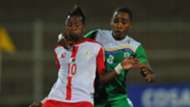 Faouz Attoumane of Comoros tackles Adriamirado Dax of Madagascar, May 2018