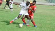 Kotoko's Ismail Ganiu and Amoako Antwi of Berekum Chelsea
