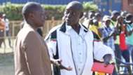 Uganda KCCA coach Mike Mutavi and Sam Timbe of Tusker.