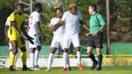 Patrick Matasi of Harambee Stars and Aboud Omar.