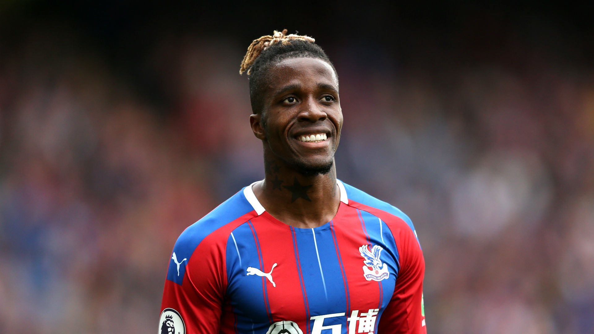 Crystal Palace's Zaha keeps fit with outdoor bicycle exercise ...