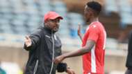 Harambee Stars and Kenya coach Francis Kimanzi with Kenneth Muguna.