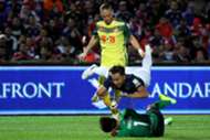 Johor Darul Ta'zim's Aidil Zafuan goes flying under a challenge by his own goalkeeper as Kedah's Ken Ilso Larsen looks on 20/1/2017