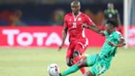 Dennis Omino Odhiambo of Kenya tackled by Lamine Gassama of Senegal.