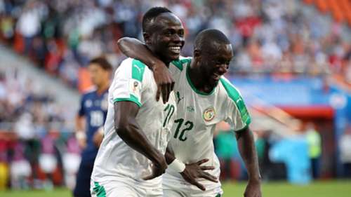Sadio Mane of Senegal celebrates the 2018 World Cup with teammate Youssef Sabali