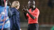 Togo coach Claude Le Roy is warned by the referee vs Kenya and Harambee Stars.