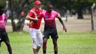 Wilka Da Silva of Simba SC and Patrick Aussems.
