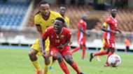 KENNETH MUGUNA of Kenya Harambee Stars vs EDILMISON DANIEL of Mozambique.