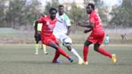 Jerry Santos and Simon Mbugua of Posta Rangers v Francis Mustapha of Gor Mahia