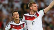 Mesut Ozil, Per Mertesacker