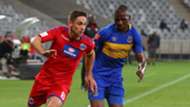 Dean Furman of Supersport United evades challenge from Thamsanqa Mkhize of Cape Town City, April 2018