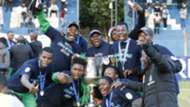 Francis Mustafa and Gor Mahia players with KPL trophy.