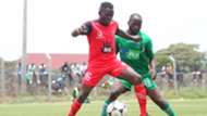 Shaban Juma of Kibera Black Stars and Dennis Orenge of KCB.