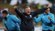 Gavin Hunt celebrates with Bidvest Wits players.