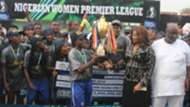 Joy Jerry recieves NWPL trophy for Bayelsa Queens
