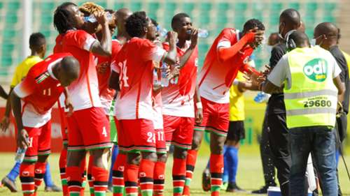 Kenya and Harambee Stars players break water against Tanzania
