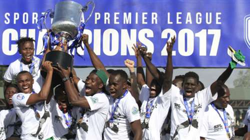 Gor Mahia player and KPL trophy.