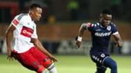 Gabadinhno Mhango of Bidvest Wits challenged by Happy Jele of Orlando Pirates