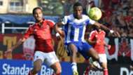 Egyptian's Al Ahly player Saed Ebib Waleed (L) vies with Sewe Sport player Ngoran Kouadio (R)