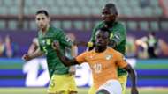 vory Coast Jean Michael Seri and South Africas defender, Thamsanqa Mkhize, June 2019