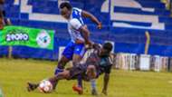Kepha Aswani of Sofapaka takes on a Kisumu All-Stars player.