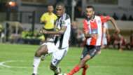 Ben Malango of Tout Puissant Mazembe, Badr Boulhroud of FATH Union Sport