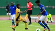 Aduana Stars defender Paul Aidoo (right)