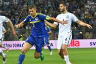 Edin Dzeko Kostas Manolas Bosnia Greece